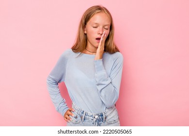 Caucasian Teen Girl Isolated On Pink Background Yawning Showing A Tired Gesture Covering Mouth With Hand.