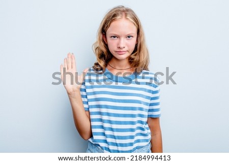 Caucasian teen girl isolated on blue background smiling cheerful showing number five with fingers.