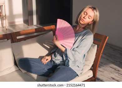 Caucasian Tired Overheated Woman Using Wave Fan Suffer From Heat Sweating, Middle Aged Woman Cools Herself, Closed Eyes Feels Sluggish Due Problem No Air Conditioner At Home At Summer Weather.
