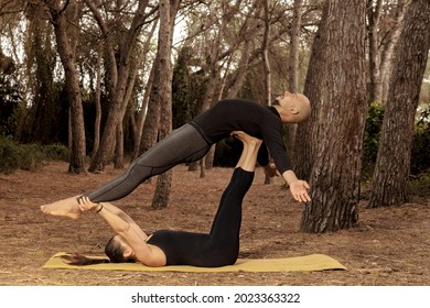 Caucasian Woman Does Acroyoga With Latino Man, Role Reversal