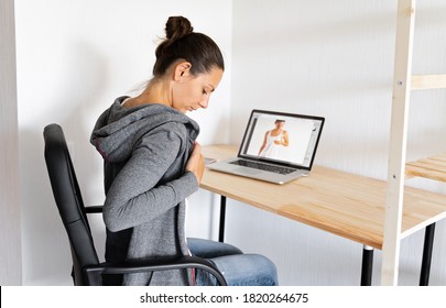 Caucasian woman doing self breast check up by online tutorial with doctor. 