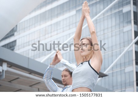 Similar – Young, tall woman sits in a summer dress on the beach of the Baltic Sea and smiles