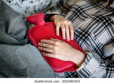 Caucasian woman having painful period cramps - Powered by Shutterstock