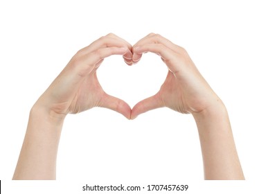 
Caucasian Woman Holding Her Hands In The Shape Of A Heart As A Sign Of Love On White Isolated Studio Background