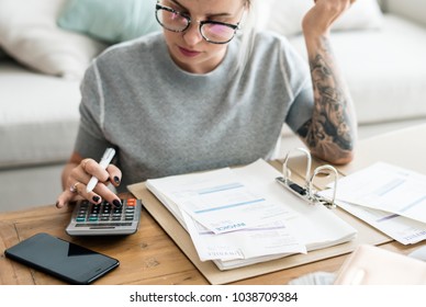 Caucasian woman with invoice bills