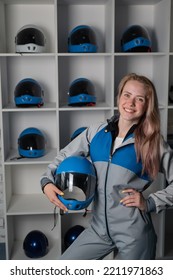 Caucasian Woman Puts On A Helmet Before Flying In A Wind Tunnel. Free Fall Simulator.