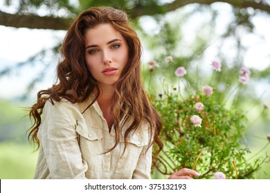  Caucasian  woman smiling happy on sunny summer or spring day outside in park. - Powered by Shutterstock