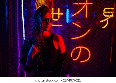 Caucasian woman in sunglasses posing in fog in neon studio. - Powered by Shutterstock