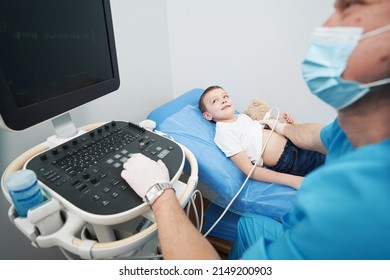 Caucasian Young Boy Undergoing Lung Ultrasound At Clinic