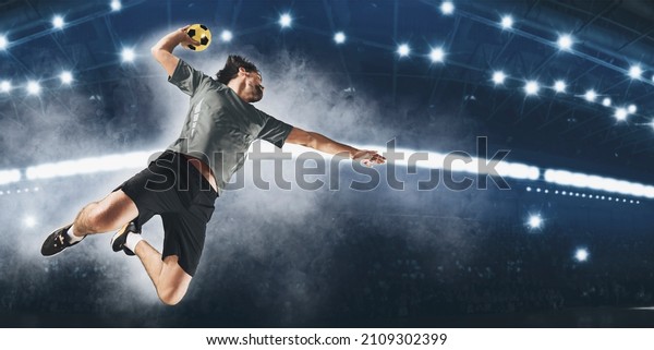 Caucasian young\
handball player in action. Concept of sport, movement, energy,\
dynamic, healthy\
lifestyle