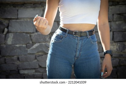 Caucasian Young Woman Threatening With Fist.