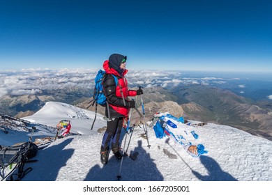 Caucasus / Russia - 06/08/2018 Group of climbers climbing mountain peak Elbrus - Shutterstock ID 1667205001