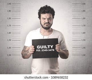 Caught Guilty Man With ID Signs On His Hand.