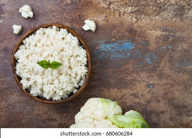 Cauliflower Rice In A Bowl. Top View, Overhead, Copy Space 