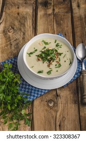 Cauliflower Soup With Blue Cheese, Roasted Nuts And Herbs On Top, Ready For Advertisnig, Nice Wooden Board, Old Wood