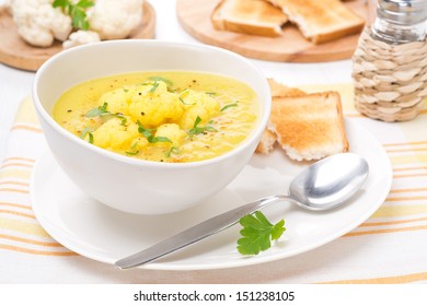 Cauliflower Soup With Curry In A Bowl