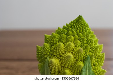 cauliflower with spiral shaped inflorescences similar to a fractal. cauliflower verdercon conical inflorescences, winter vegetables