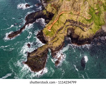 Causeway Coast Near Giant's Causeway Without Tourists Aerial View Of Waves And Basalt Rocks.