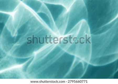 Caustic shadow blue overlay from sunlight reflections. Abstract water backdrop from light refraction underwater textured effect. 