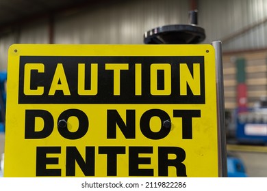 Caution Do Not Enter Sign On Factory Shop Floor