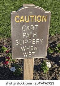 Caution golf course path sign