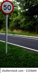 Caution Road Sign. The Speed Limit On This Road Is 50 Miles Per Hour Northumberland UK