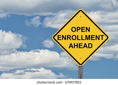 Caution Sign Blue Sky Background - Open Enrollment Ahead  - Shutterstock ID 670957852