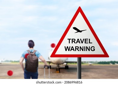 Caution Sign Of New Variant Of Covid 19 Omicron On The Airport. Travel Warning Concept 