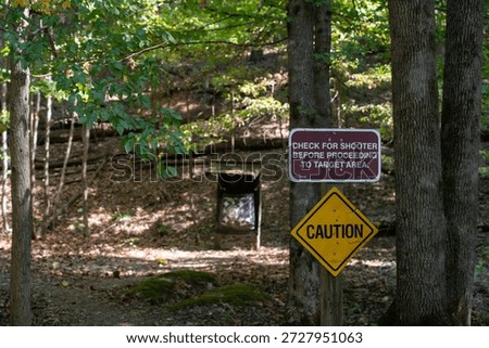 Caution sign warning about target shooting range