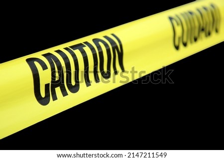 Caution Tape. Yellow Caution Tape. Caution, Cuioado plastic tape. Do not enter tape. Warning sign. 