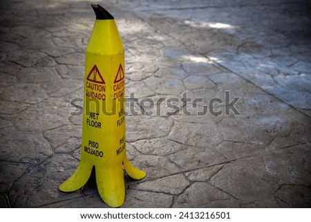 Caution Wet floor banana sign as a warning