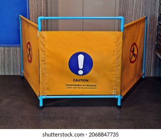 Caution Yellow Warning Lift Or Elevator Closed For Repair Or Maintenance. The Safety First Concept, Blocking Space By Technicians For Repair Or Maintenance Of Elevator Passenger.