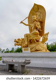 Cavan Monaghan, Ontario, Canada - June 9, 2018: Statue in Wutai Shan Buddhist Garden near Peterborough in Cavan Monaghan, Ontario, Canada. 
The largest Buddhist temple complex outside of China.  
