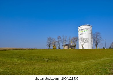 Cavan Monaghan, Ontario, Canada - November 9, 2021: Cavan Monaghan and Milbrook signs in the water tower in the horizon in a beautiful day.