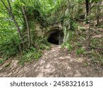 Cave entrance at Stari Grad in old historic city Krapina, Croatia, Hrvatsko zagorje, nature background, Neanderthal, Palaeolithic archaeological site