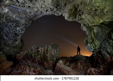 Cave exploration at night in South Africa - Powered by Shutterstock