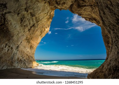 Cave on the beach of Cala Luna from inside to the mediterranean sea 
