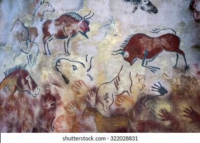 CAVE PAINTINGS , ROCK PAINTINGS , bisons painted on a rock , bisons painted on a cave, horses painted on a rock, horses ,hands ,buffalos painted on a cave and on a rock - Shutterstock ID 322028831