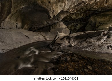 Cave with a river through it