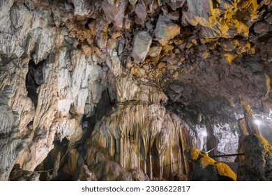 Cave with stalactites and stalagmites in Laos. Angel cave underground cave.