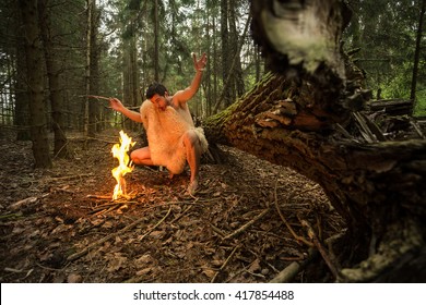 caveman got a fire in the forest, in the skin