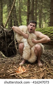 Caveman Produces Fire In The Forest, In The Skin