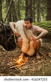 Caveman Produces Fire In The Forest, In The Skin