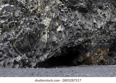 The cavernous opening of Halsanefshellir basalt cave on Reynisfjara beach, Iceland