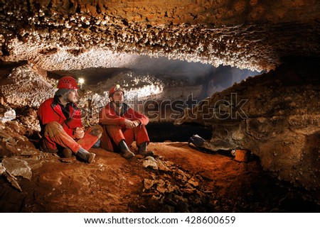 Cavers exploring a beautiful cave