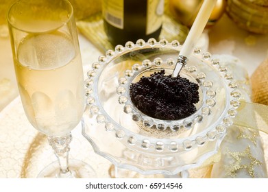 Caviar And Champagne Over Luxury Table