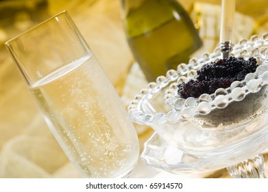 Caviar And Champagne Over Luxury Table