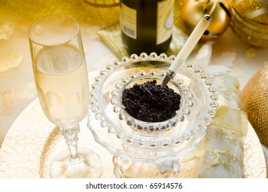 Caviar And Champagne Over Luxury Table