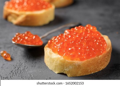 Caviar, a jar of caviar, composition with caviar, a sandwich with caviar
