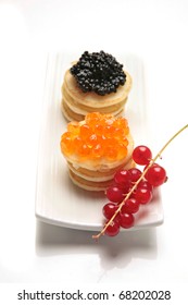 Caviar Over Traditional Russian Blinis